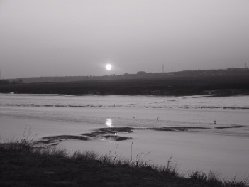le meme coucher de soleil en noir/blanc