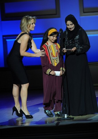 NEW YORK - NOVEMBER 10: Katie Couric, Nujood Ali and Shada Nasser attends the 2008 Glamour Women of the Year Awards at Carnegie Hall on November 10, 2008 in New York City. From Getty Images.