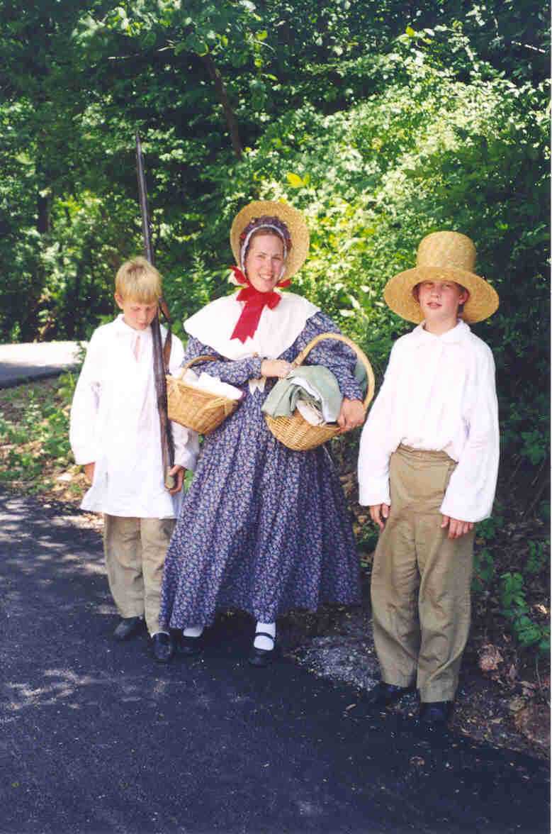 Betsy Urven and sons at 
Lincoln's New Salem, July, 2001.
(Credit: Rusty Ayers.)