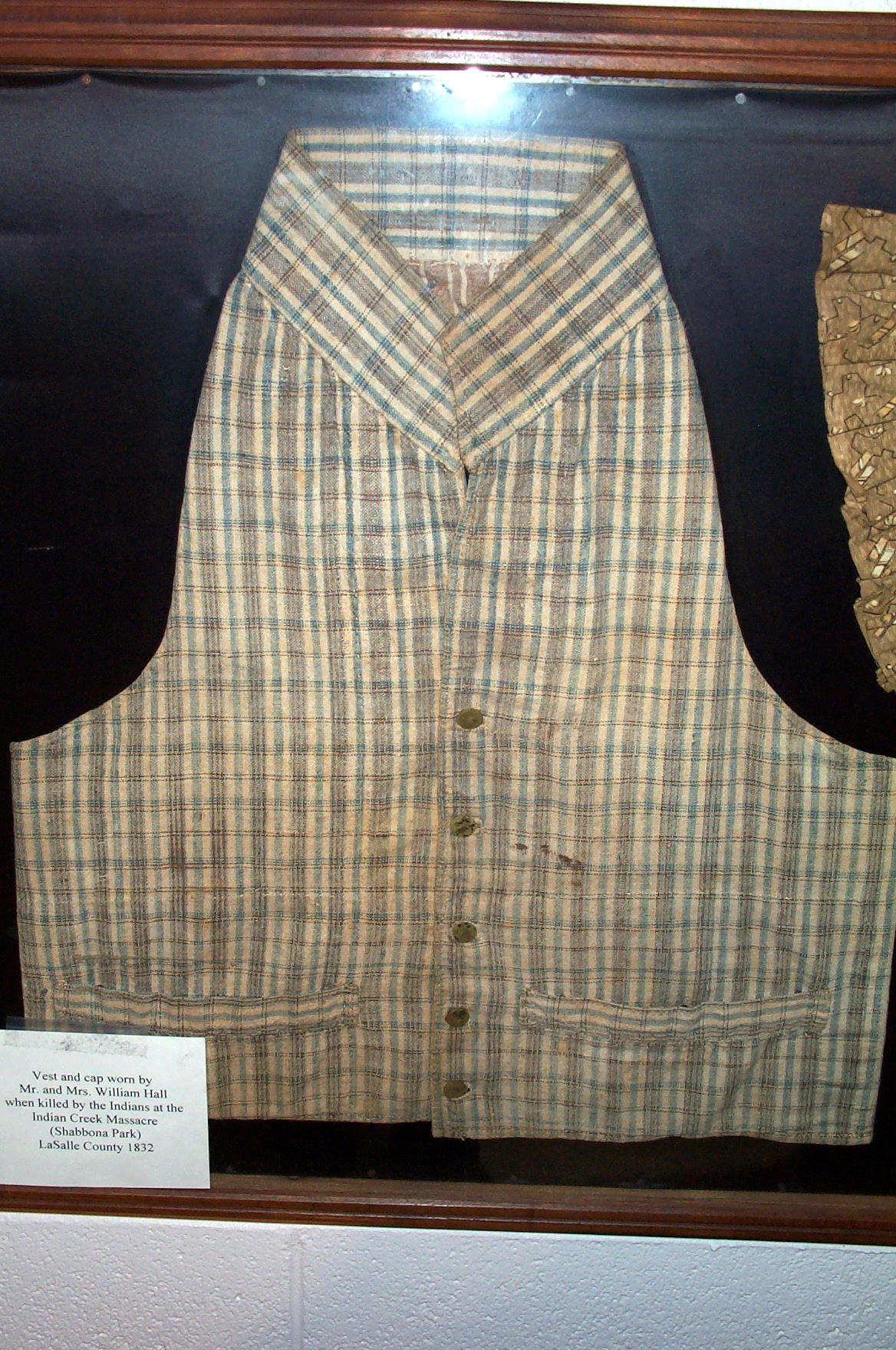 This bloodstained standing collar vest with large welted pockets was worn by William Hall at the time of his death 
during the Indian Creek massacre. (Credit: Jim Patton, 2006)
