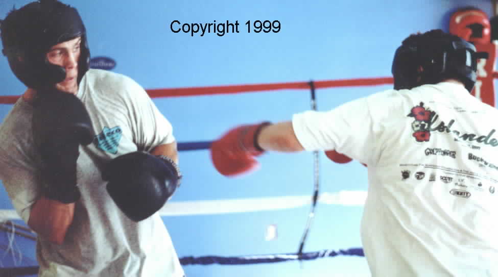 Round-robin sparring offers a fighter to practice against a variety of fighters each with a different style.  Image copyright 1999.  All rights reserved.