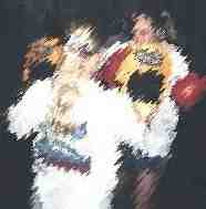 During class, students work with each other on different punches using bag gloves and focus mitts.  Image Copyright (c) 1999.  All rights reserved.