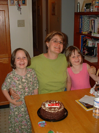 The kids and I in front of my birthday cake