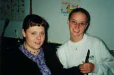 Brianne, our lovely floater at 13's 2000, giving Erin her fork and knife during a meal.&nbsp; WE LOVE OUR FLOATERSL