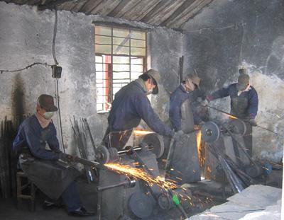 Shaolin sword factory at the Shaolin Temple, Henan Province, China