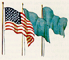 Image of USA flag displayed with two other flags.