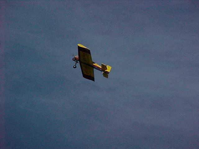 The FunTiger Extra ARF on climb out on another bombing run