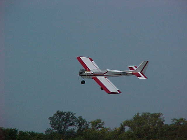 Bill Kearns does a fly by with his Goldberg tiger 60 during the bomb drop competition