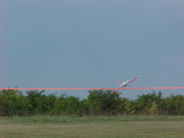 On the last pass they both missed the ribbon.&nbsp; Here keith sets up to hit it.