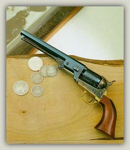 Colt Mod. 1851 Navy,engraved,silver plating,cased,postwar,cal..36,no.  16337. Matching numbers. Octagonal barrel,bright bore,length 7-1/2. Six  shots. Manufactured in 1975. Firm address on barrel,on frame marked Colts  Patent. On cylinder roll