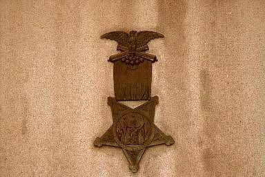 Civil War Soldiers and Sailors Monument Base, left side, G.A.R. Medal