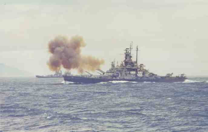 USS Indiana bombarding japanese shore positions