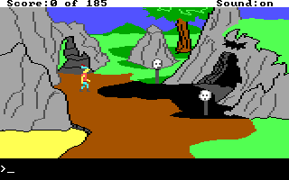 Who put those human skulls on stakes outside this cave?