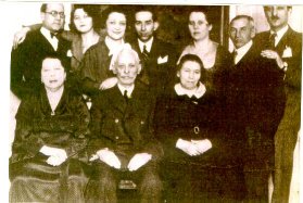 Family at a party; Actual size=240 pixels wide