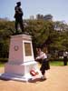 Jean lays a wreath