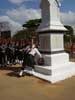 Bill lays a wreath at the Memorial