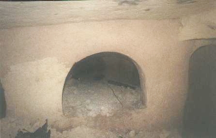 'Plaster' covering visible on Baldacchino Tomb