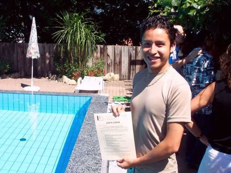 "Ing. Yasfani" showing off his LSS diploma  C.Y. Aguilar 2003