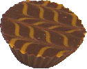 25% Baileys ganache in a milk cup with orange fanned lines