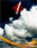 Blue Sky, Red Flag and Yellow Sail