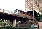 SP 1900 e.m.u. set departs Tai Po Market station and heads for Lo Wu, April 17 2007