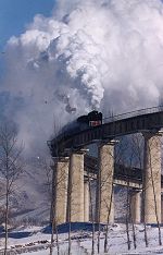 A mixed freight puts on a grand display of steam, January 18 2000