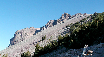 Volcanic ridges tower above