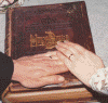 hands on bible.gif (108996 bytes)