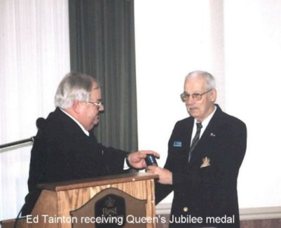[Ed Tainton receiving Queen's Jubilee Medal]