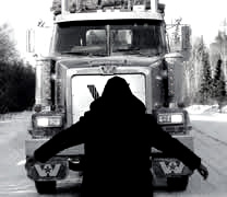 A Member of the Asubpeeschoseewagong (Grassy Narrows First Nation) standing up.