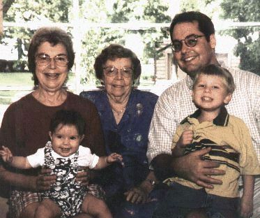 In this photo are 4 Generations, Ruth (McDonough) Pearl in the rear, the (left) Barbara, Tedrick, and Addison. Madeleine sits in Barbara's lap.