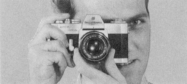 Holding the Bell and Howell Auto 35