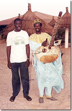 Malick Jeng (left) with kora player.