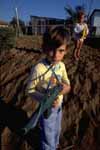 Boy playing in Rio slum