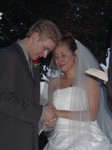 Tim prays for the couple