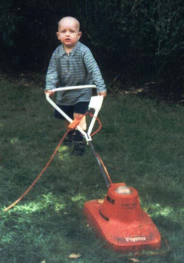 Picture of Owain using a hover mower