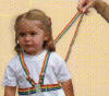 Child safety harness with reins.  
