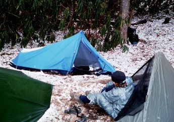 Julie's tent is the blue one. In the snow.