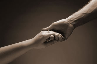 Image of two hands joining