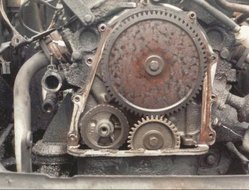 Valve timing gears on a Ford Taunus V4 engine — the small gear is on the crankshaft, the larger gear is on the camshaft. Since the camshaft gear is twice the diameter of the crankshaft gear, it runs at half the crankshaft RPM. See gear ratio. (The small gear left is on the balance shaft)