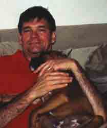 Dad snuggles with da baby