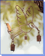 Rufous Hummer on wind chime