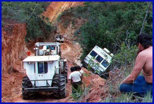 Vibrators wenching the recording vehicle up a steep incline. Fortunately teamwork paid off.