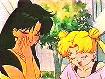 Setsuna blushes with Usagi in slight embarassment over their comrads