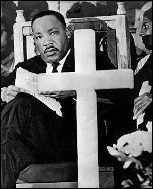 Rev. Martin Luther King Jr. speaks at a Montgomery voter rally held in a church. Feb. 9, 1965.