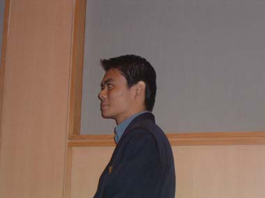 Nanyang Polytechnic Graduation 2003 - Paul awaiting receipt of diploma