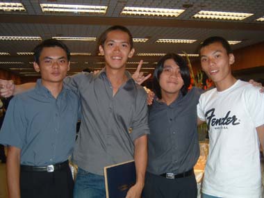 Nanyang Polytechnic Graduation 2003 - From Left : Paul, Mike, Leonard and Vincent at buffet reception