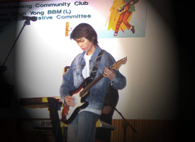 Six Strings Extravaganza - Vincent performing on the guitar