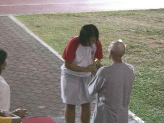 Lim huijuan receiving her Bronze medal for Shotput