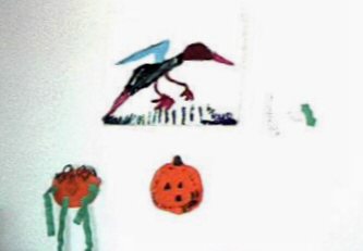 Children's artwork on a wall of the house